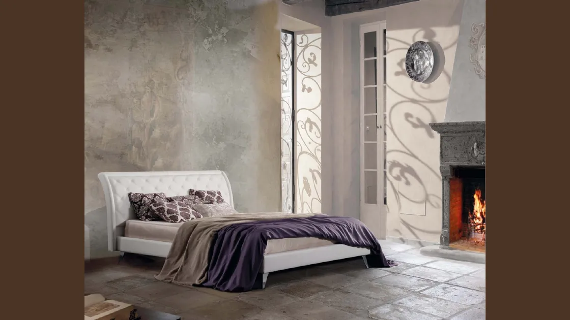 Letto in tessuto con testiera trapuntata in lavorazione capitonné Charme di Lettissimi