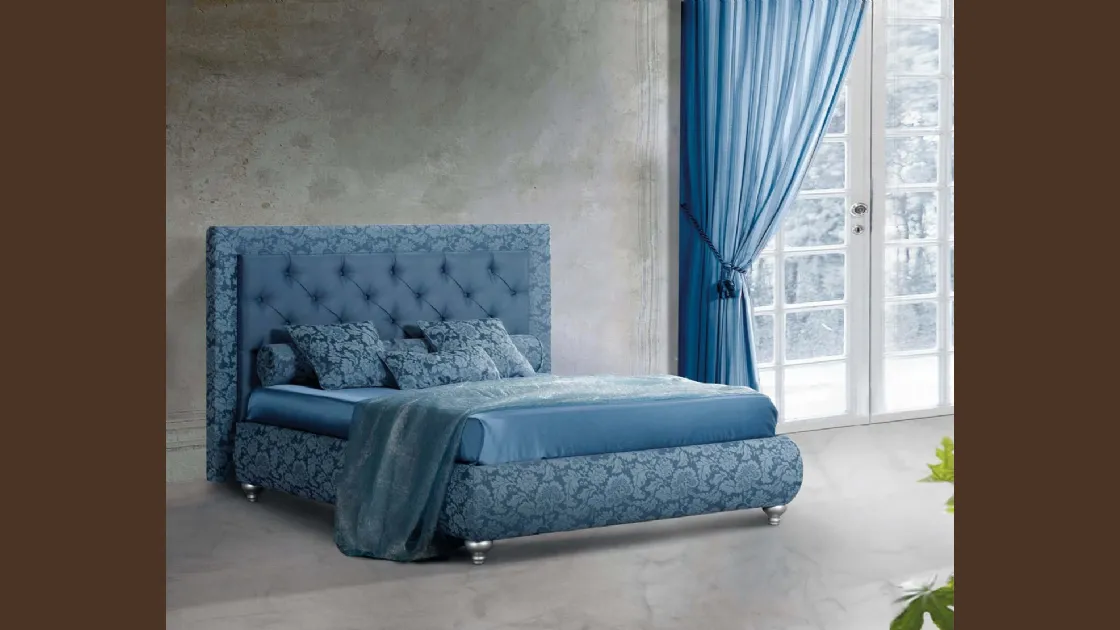 Letto in tessuto damascato con testiera in tessuto trapuntato Immagine di Lettissimi